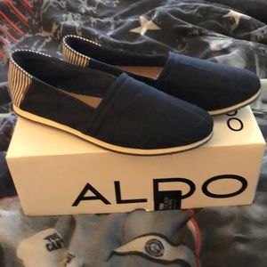 Aldo blue and white slip on’s